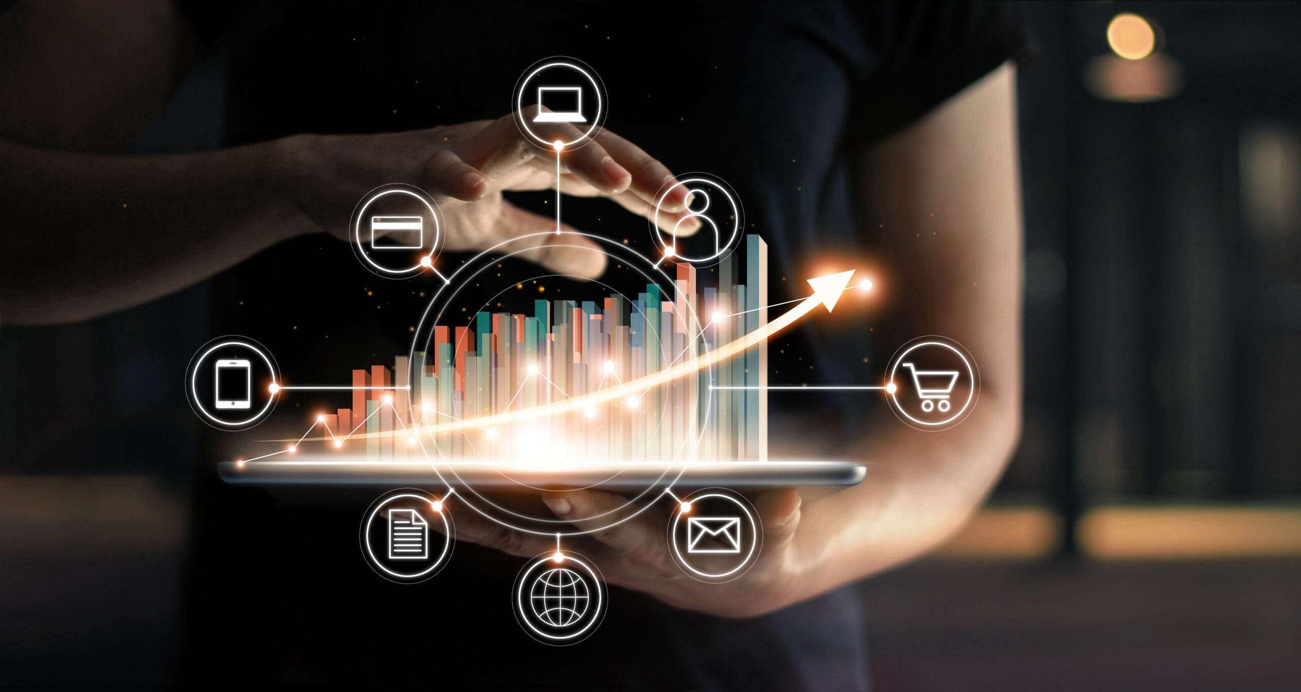 Business people holding tablet and graph chart statics growing in e-commerce global market and icon customer network connection on virtual interface. Arrow graph corporate future growth plan. Digital Online Marketing. Business ecommerce technology. Image by Adobe Stock