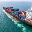 Aerial view cargo container ship sailing, container cargo ship in import export and business logistic and transportation of international by container ship in the open sea. Asset tracking