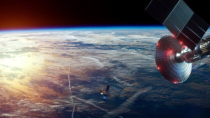 Space satellite with antenna and solar panels in space against the background of the earth. Telecommunications, high-speed Internet, space exploration. mixed medium, copy space. image furnished by NASA.